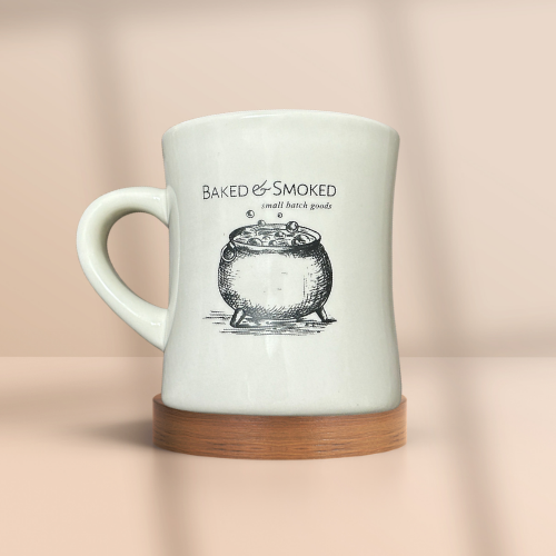 Mug with bubbling cauldron that says Baked and Smoked